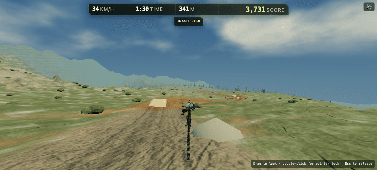James riding a mountain bike down an open alpine trail
